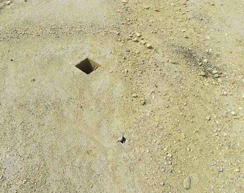 A view of the ground where the column was cut.